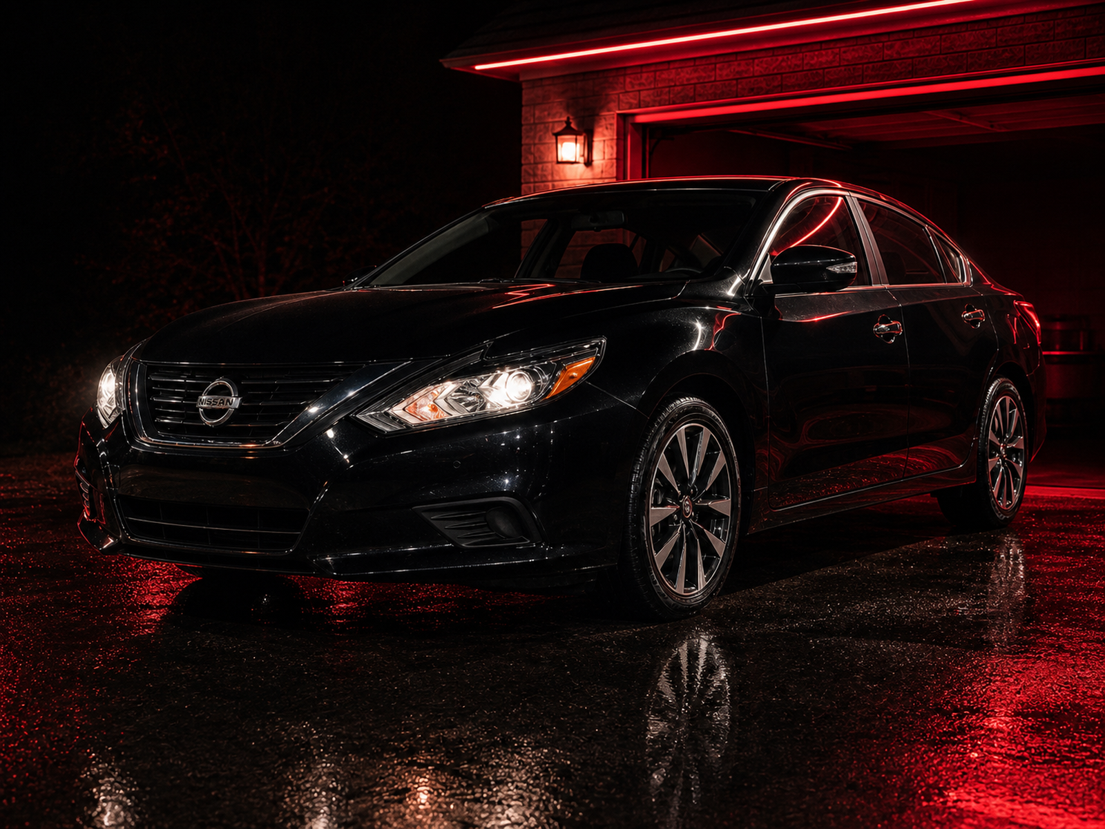 Freshly detailed Nissan Altima with clean glossy paint and visible Nissan grille badge
